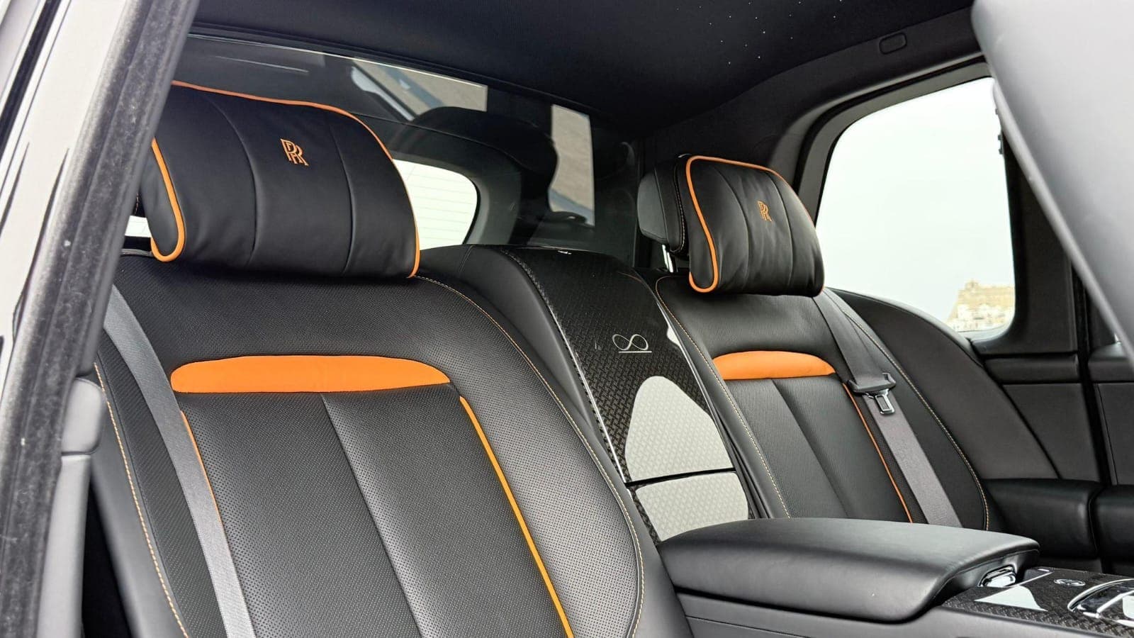 Rolls-Royce Cullinan interior, black leather with orange trim, FFGR Paris fleet