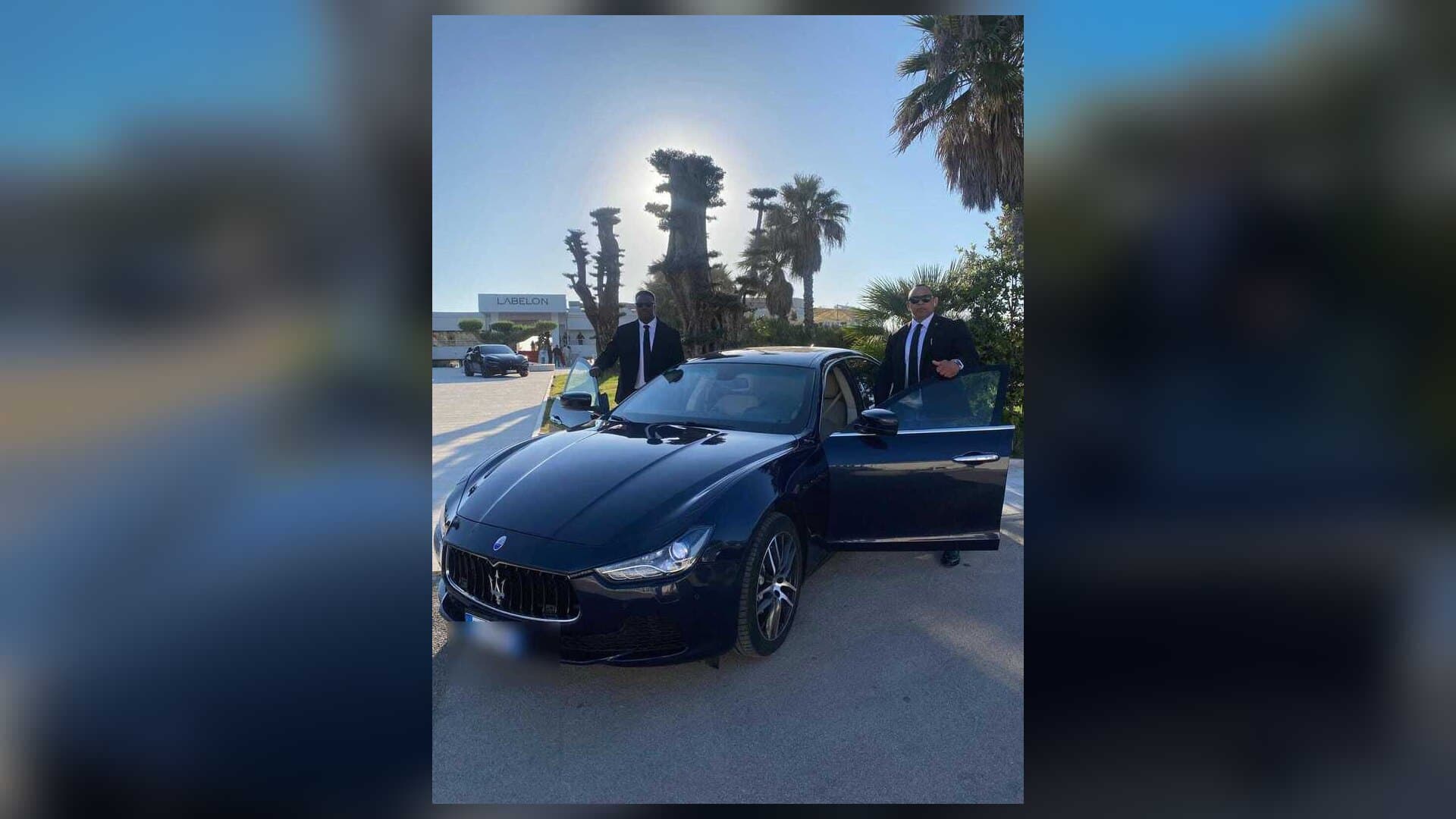 Close protection agents beside a Maserati, FFGR Paris security