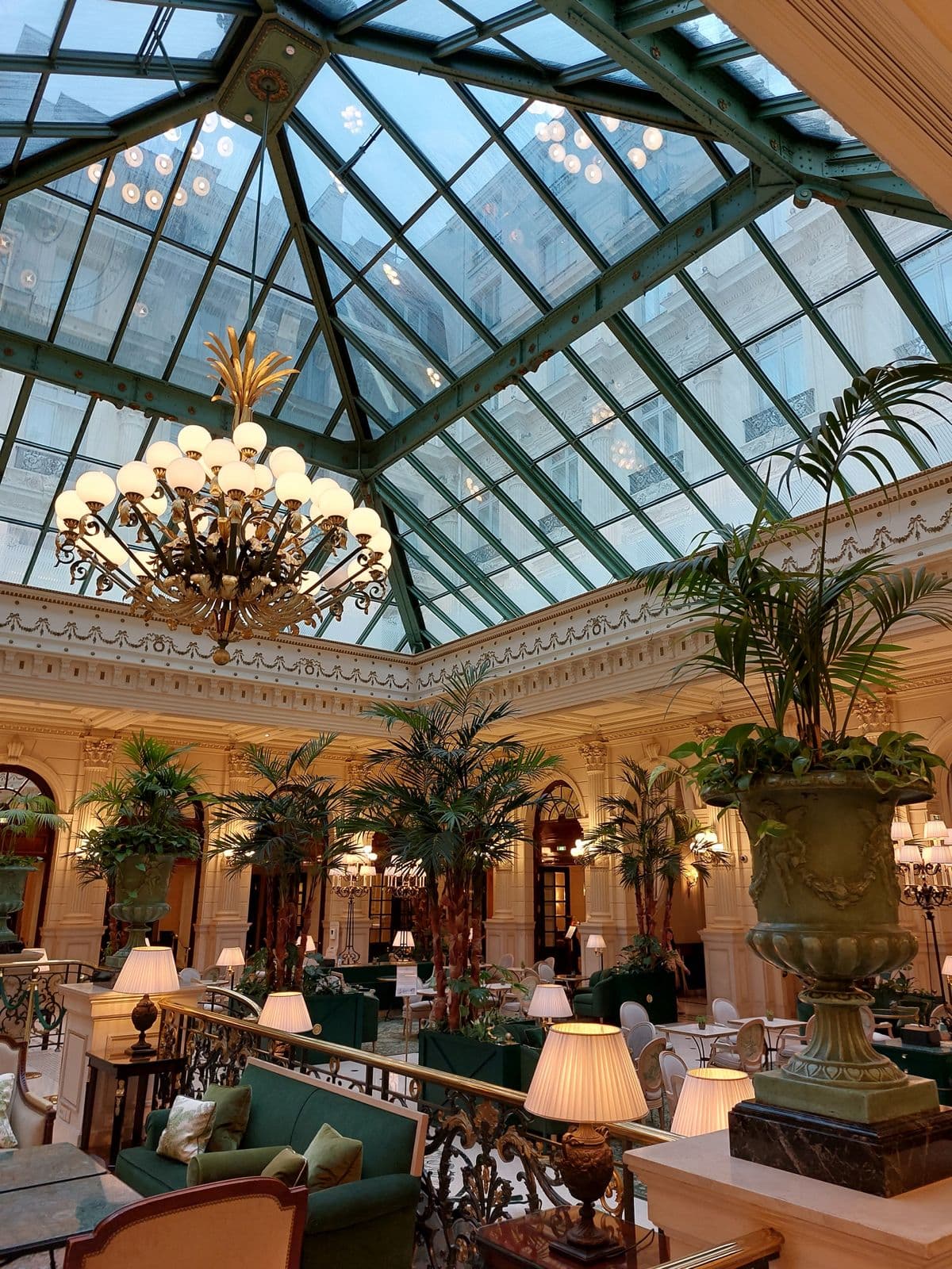 Glass-roofed winter garden of a Paris palace hotel, FFGR Paris concierge